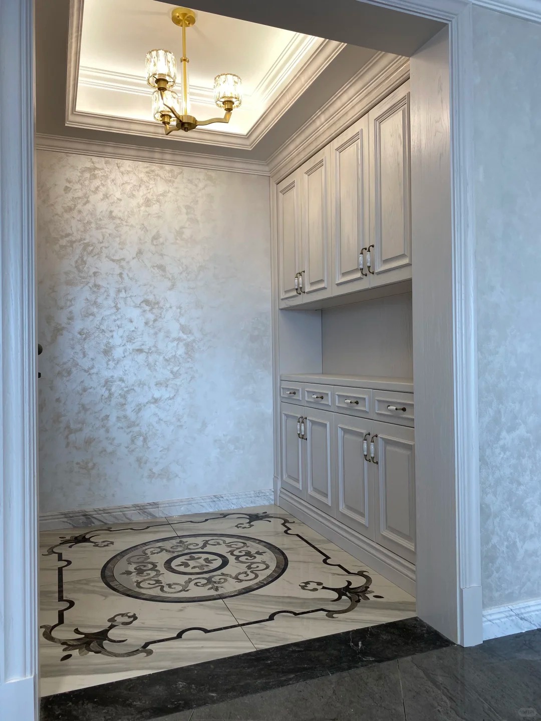 Interior cabinet area with wall surface finish